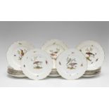 Twenty one Meissen porcelain plates with bird decorBlue crossed swords mark with and without dot,