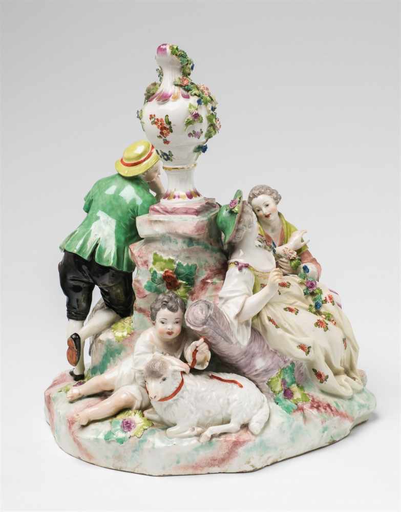 A Vienna porcelain shepherd groupFour figure group with a sheep and a ram surrounding a central - Image 4 of 5