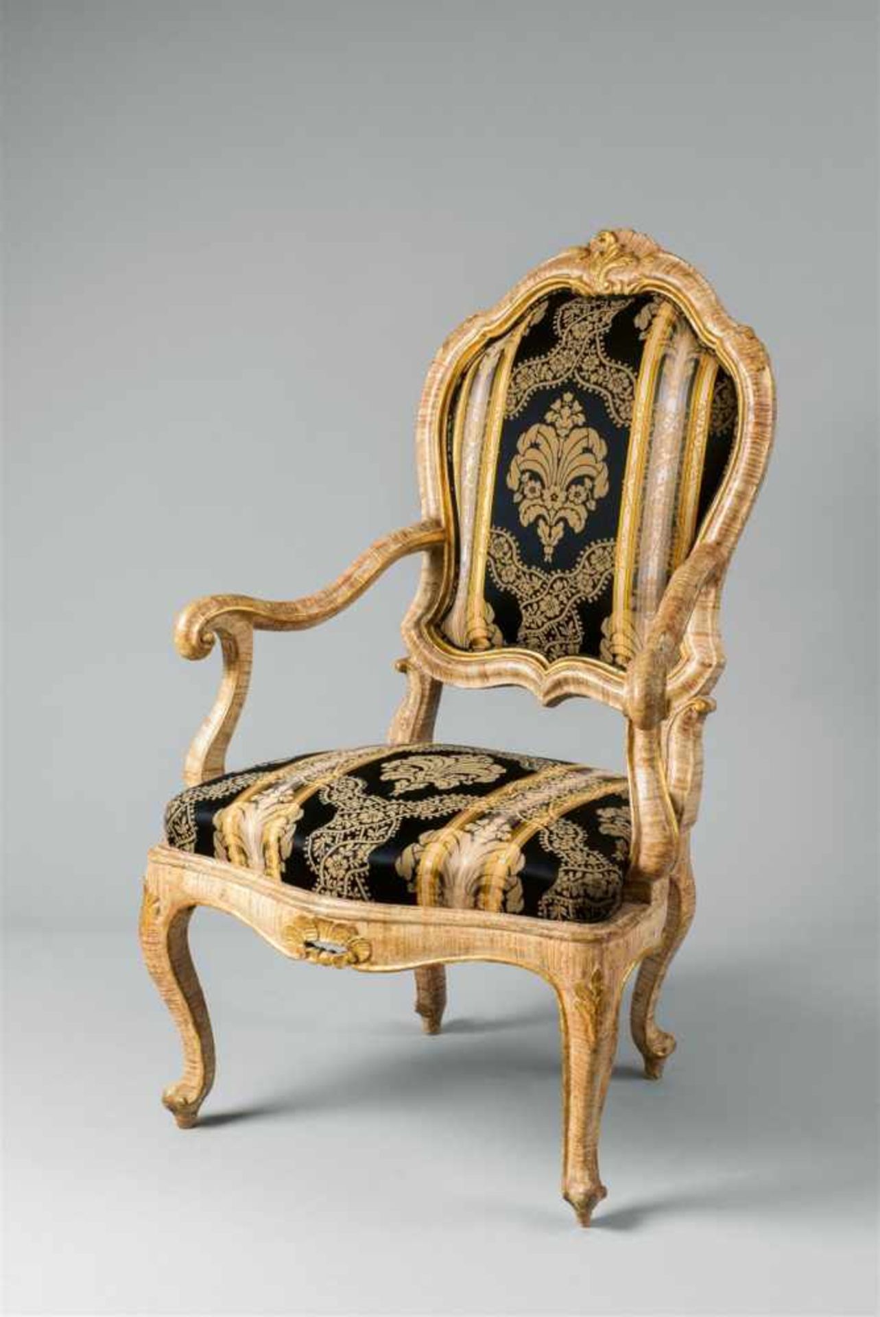 A poltrona veneziana armchairPainted and gilt wood, modern textile covers over replaced