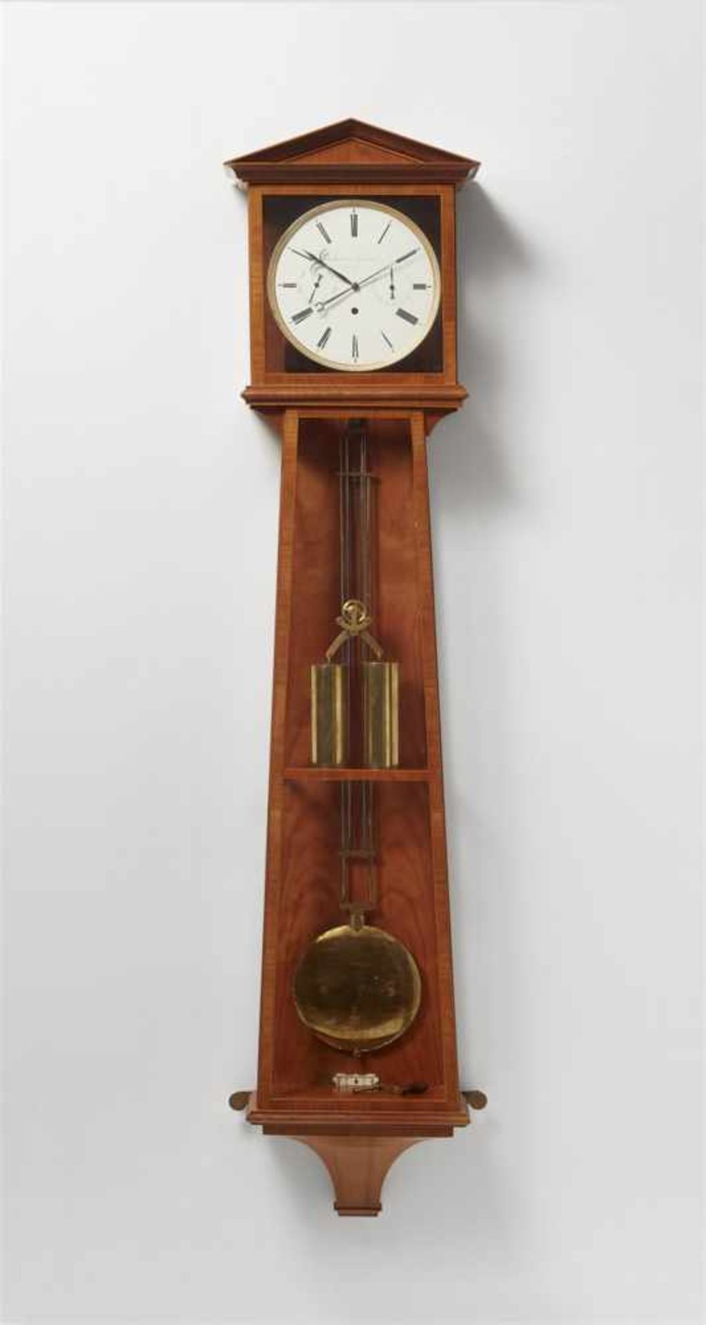 A rare Viennese wall clockCherry and boxwood veneer on softwood, glazing, white enamel dial with