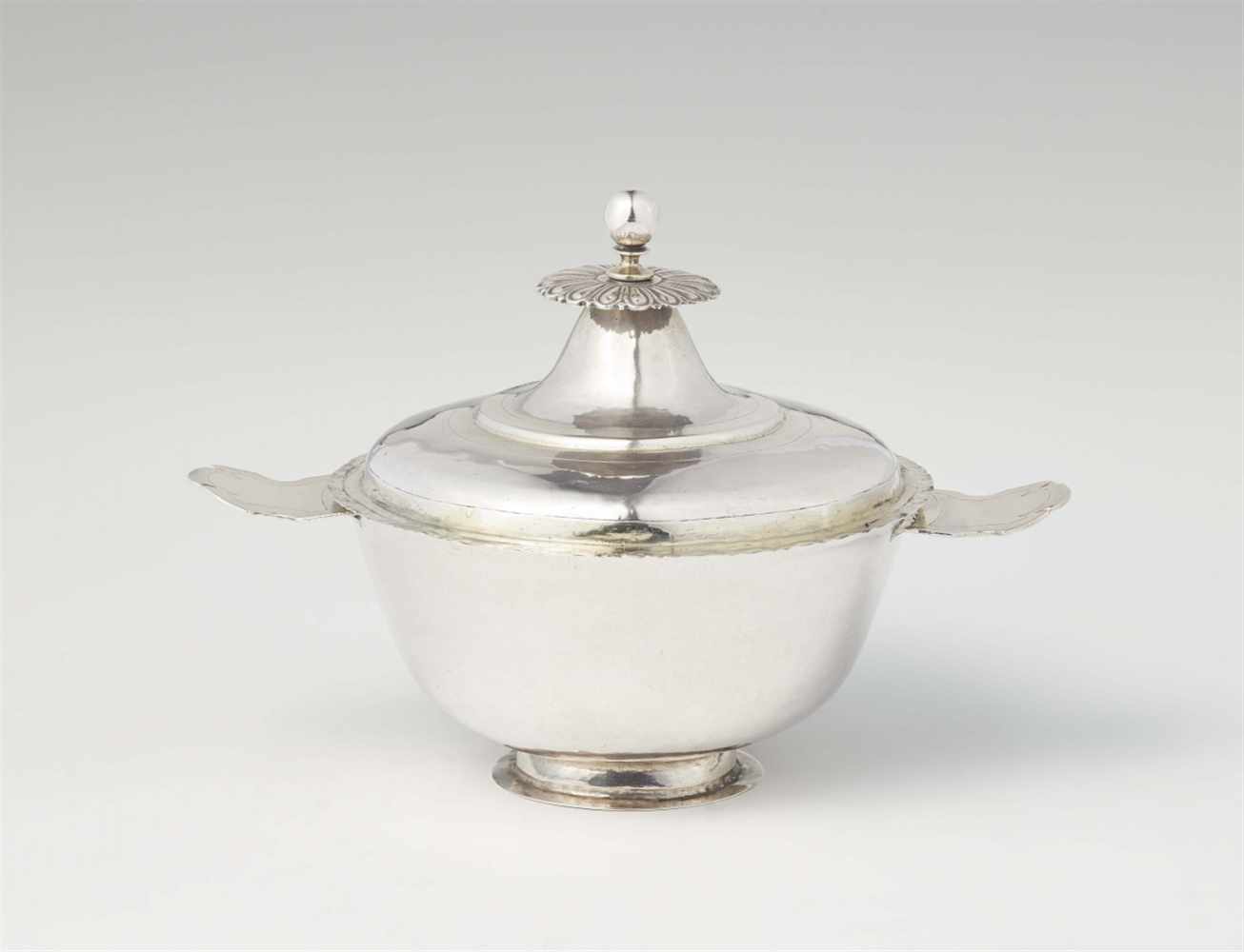 A Renaissance silver dish and coverInterior gilt dish with pierced handles on waisted basal rim. The