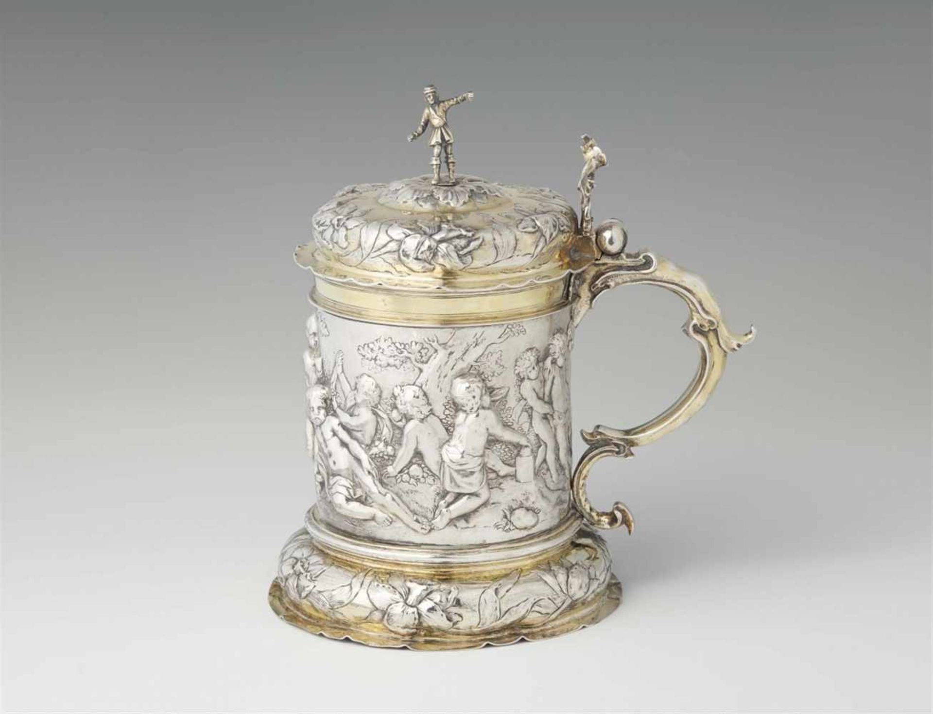 An important Hamburg parcel gilt silver tankardCylindrical corpus, the basal rim and domed lid