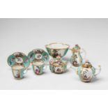 A Meissen porcelain tête à tête with Watteau scenesCoffee pot, tea pot and sugar box with covers,