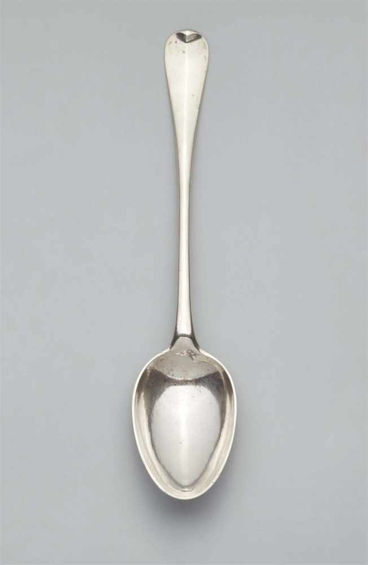 A Berlin silver dumpling spoonL 33.2 cm, weight 203 g. Berlin, attributed to Johann Daniel Sandrart,