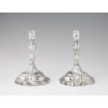 A pair of Augsburg silver candlesticks by Johann HeckenauerRound scalloped base supporting a twist