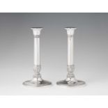 A pair of Brussels silver candlesticksOf Neoclassical design, the round bases with palmettes. H 27