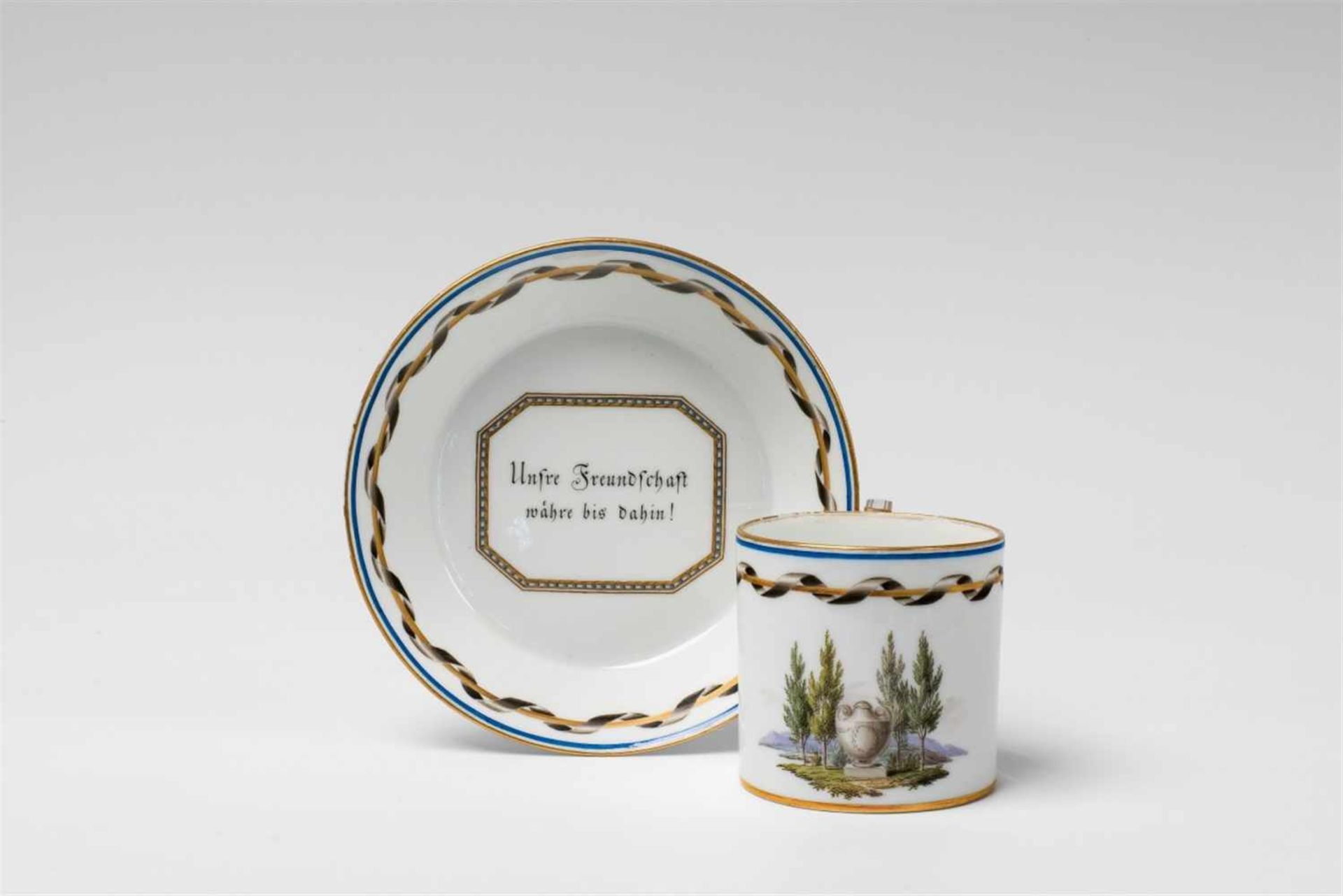 Two Meissen porcelain friendship cupsOf cylindrical and flaring form, with original saucers and