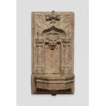 A German marble wall fountain with a Gothic archPale yellow tinted marble, presumably German. Two-