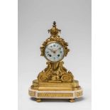 A Louis XVI style ormolu pendulum clockFire-gilt bronze, white marble, white enamel dial with