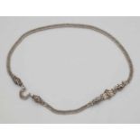 A Nuremberg silver bridal beltDesigned as a flat narrow chain, the cast silver decorative clasp