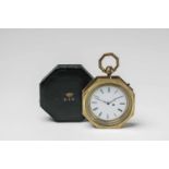 A German carriage clock in the original leather caseBrass clock with white enamel dial and black