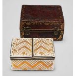 A rare gilt enamel double box in a leather caseRectangular box with silver mountings comprising