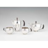 A rare Copenhagen silver service, no. 506Comprising a coffee pot, teapot, sugar bowl, and milk