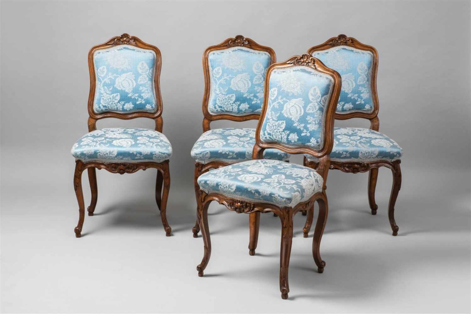 Four South German Rococo chairsCarved walnut with modern damask upholstery. Restored. H 95, seat