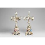 A pair of Meissen porcelain candelabraThe seven flame upper section removable, with figures of