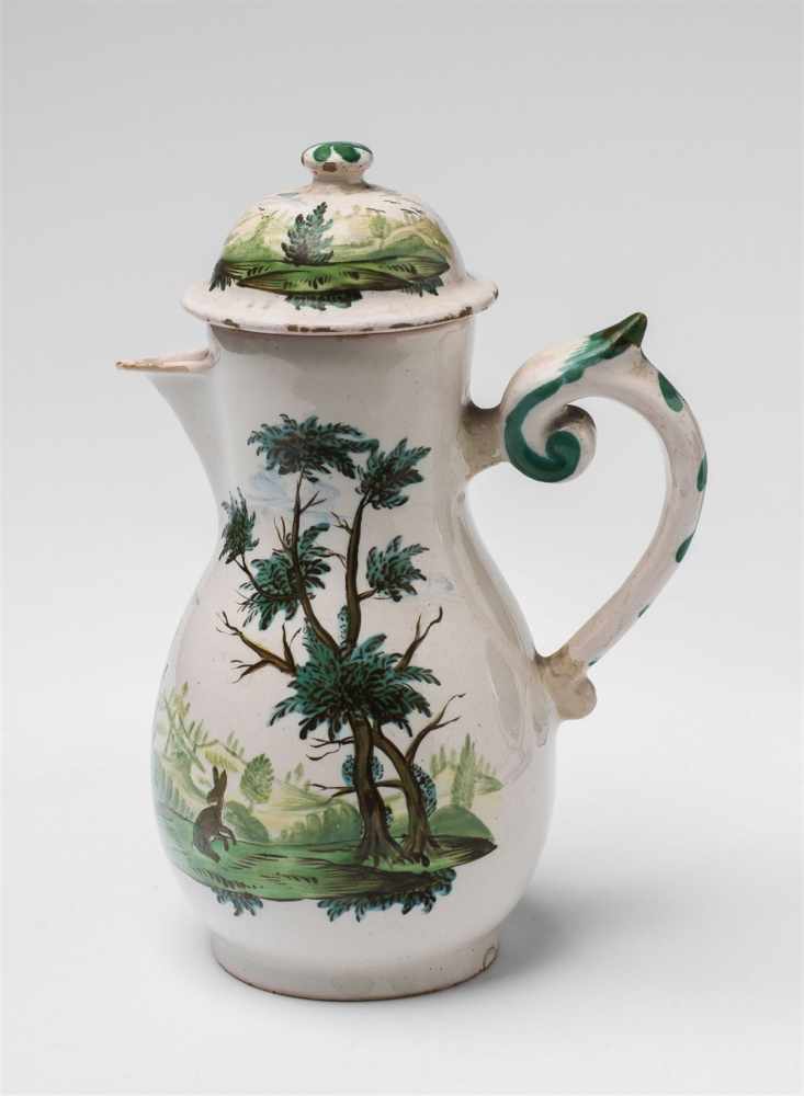 A rare Künersberg faience pitcher with a rabbit hunting sceneBlack painter's mark L (possibly of