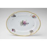 A large Meissen porcelain platter with woodcut flowersBlue crossed swords mark with curved guards