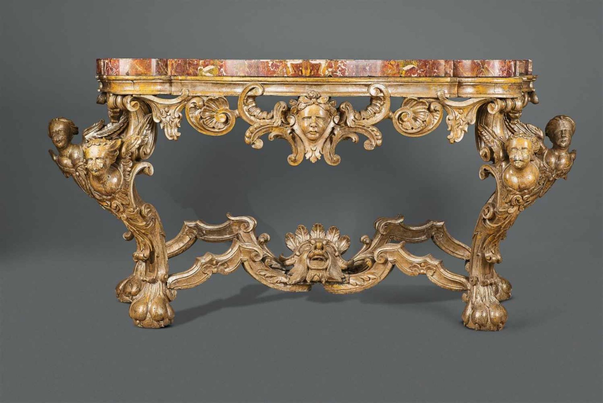 A Roman carved softwood console tableAn important monumental Baroque console table. The marble-