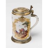 A Meissen porcelain tankard with Turkish horsemenCylindrical tankard with gilt tendril cartouches