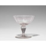 A Silesian glass goblet with engraved decorFacetted oval dish with tendril and strapwork decor