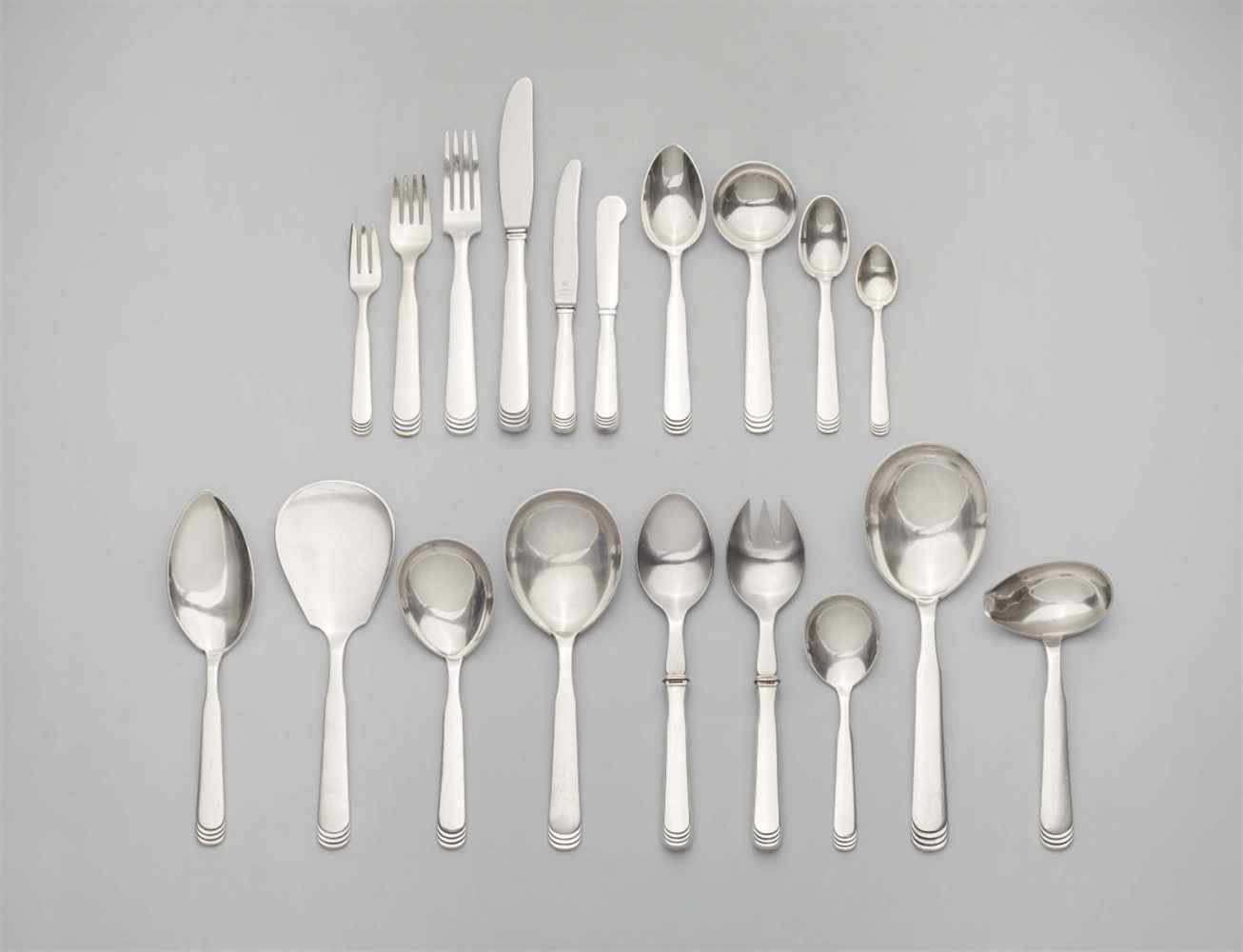 A Copenhagen silver cutlery set, no. 15114 piece set comprising 12 dinner knives, forks, and spoons,