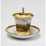 A Nymphenburg porcelain cup with a view of MunichModel no. 282, "Becher antik No 11", with