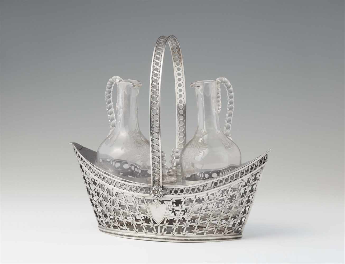 A Strasbourg silver cruet setFormed as a ship, the pierced surface with Neoclassical engraved decor.