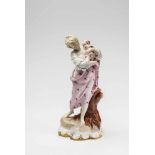 A Vienna porcelain model of a mother and childA rare model depicting a striding woman with a