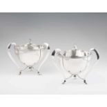 A pair of Jugendstil silver table centrepiecesDeep bowls with moulded rims resting on curved