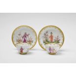 Two Meissen porcelain tea bowls and saucers with chinoiserie decorUnmarked, dreher's mark / (to