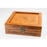 A large German Baroque gaming boxSquare travel gaming box with walnut, ebony, and aramanth