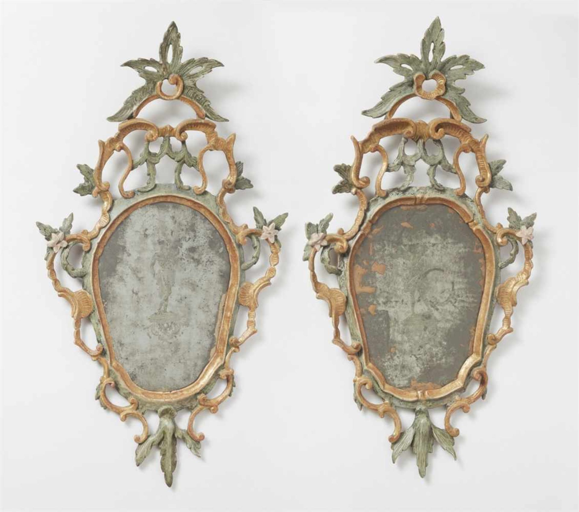A pair of Rococo giltwood mirrorsThe mirror plates etched with depictions of Diana and Jupiter. H