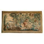 A silk "fête champêtre" tapestryDepicting seven elegant figures at rest in a forest clearing