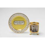 A Vienna porcelain cup with a depiction of HygieiaCylindrical form on three pad feet, with