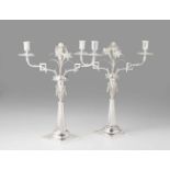 A pair of Augsburg silver candelabraTapering fluted shafts supported by square plinths with small