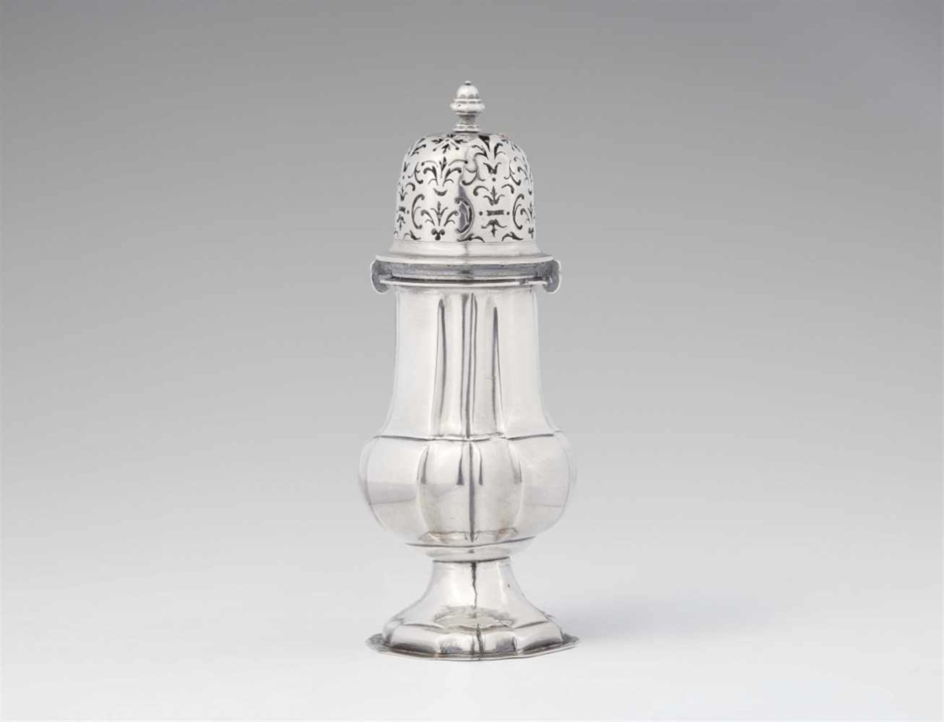 An Augsburg silver sugar casterBaluster form caster, the pierced upper section with a minor loss.