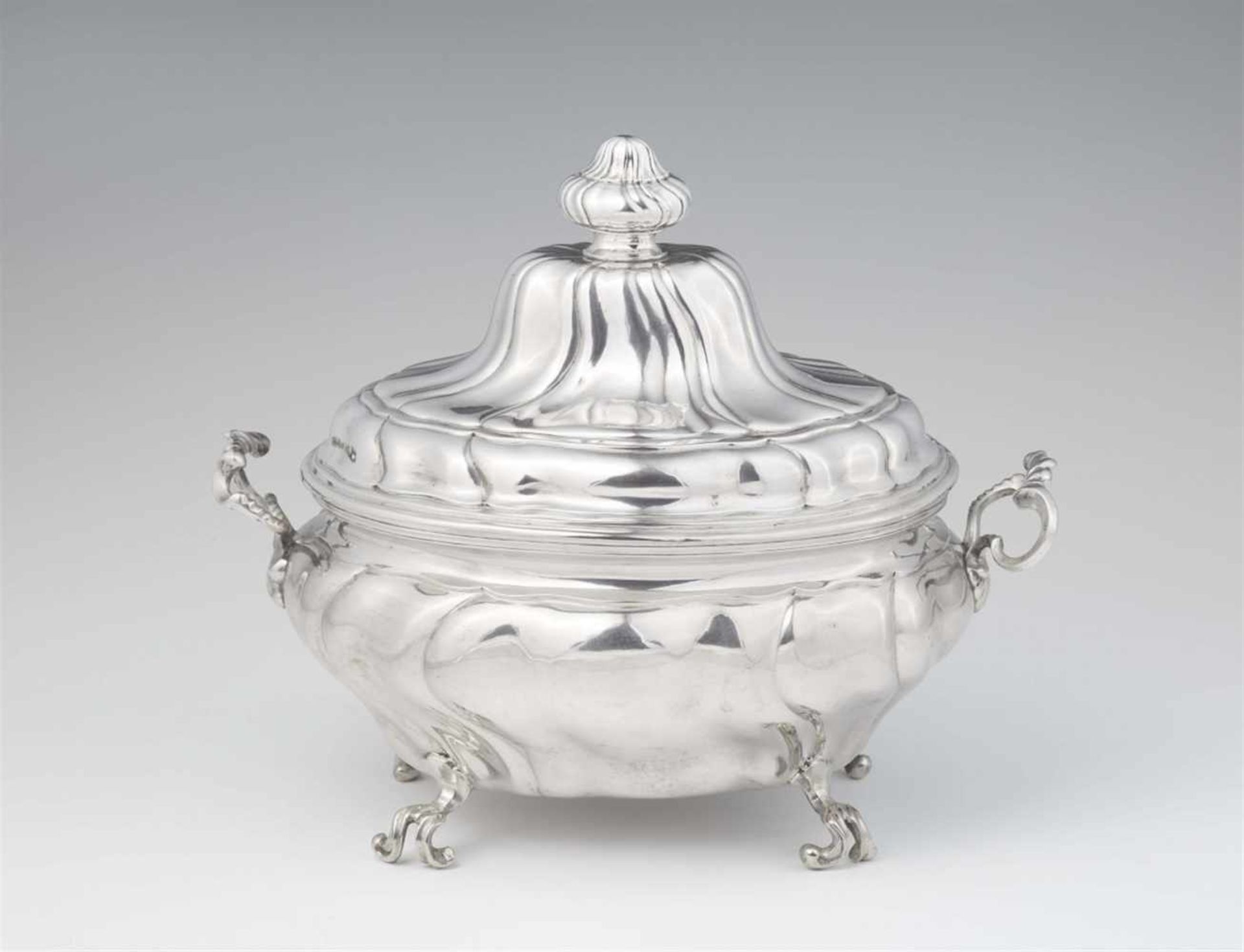 A Bautzen silver tureen and coverInterior gilt bombé form tureen with twist fluted decor and handles