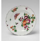 A Chelsea porcelain plate with fruit and insect decorBrown anchor mark. D 22.2 cm. Ca. 1755.Teller