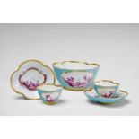 Five items of Meissen porcelain with landscape decorComprising two tea bowls with original saucers