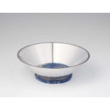 A Swedish Art Deco silver dishFlared bowl resting on a lapis lazuli base. H 8; diameter 24 cm.
