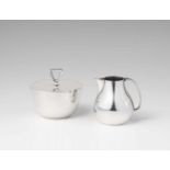 A Copenhagen silver cream set, no. 1015Sugar box and milk jug. H 7 / 7.5 cm, total weight 276 g.