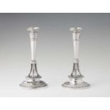 A pair of Empire silver candlesticksColumn shaped candlesticks on hoof feet. H 26 cm, weight 775
