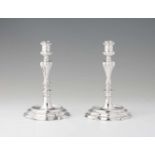 A pair of Florentine Baroque silver candlesticksRound scalloped bases supporting gadrooned
