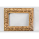 An Italian Renaissance giltwood frame76.5 cm x 58.8 cm, interior 52.7 cm x 36.5 cm. Attributed to