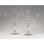 A pair of Ghent silver candelabraRound base with palmette fries, the fluted shafts supporting vase