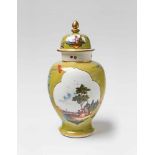 A rare Meissen porcelain Augustus Rex vase and cover with pea green groundOf stout baluster form,