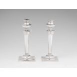 A pair of Hannover silver candlesticksSlightly tapering shafts on square plinths. H 20 cm, weight