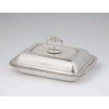 A Victorian silver dish and coverRectangular dish with gadrooned rim, the finial with a bayonette