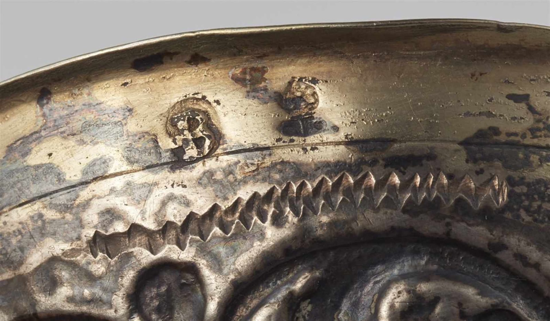 An Augsburg silver gilt brandy bowl with a phoenixOval scalloped dish decorated with an engraved - Image 2 of 2