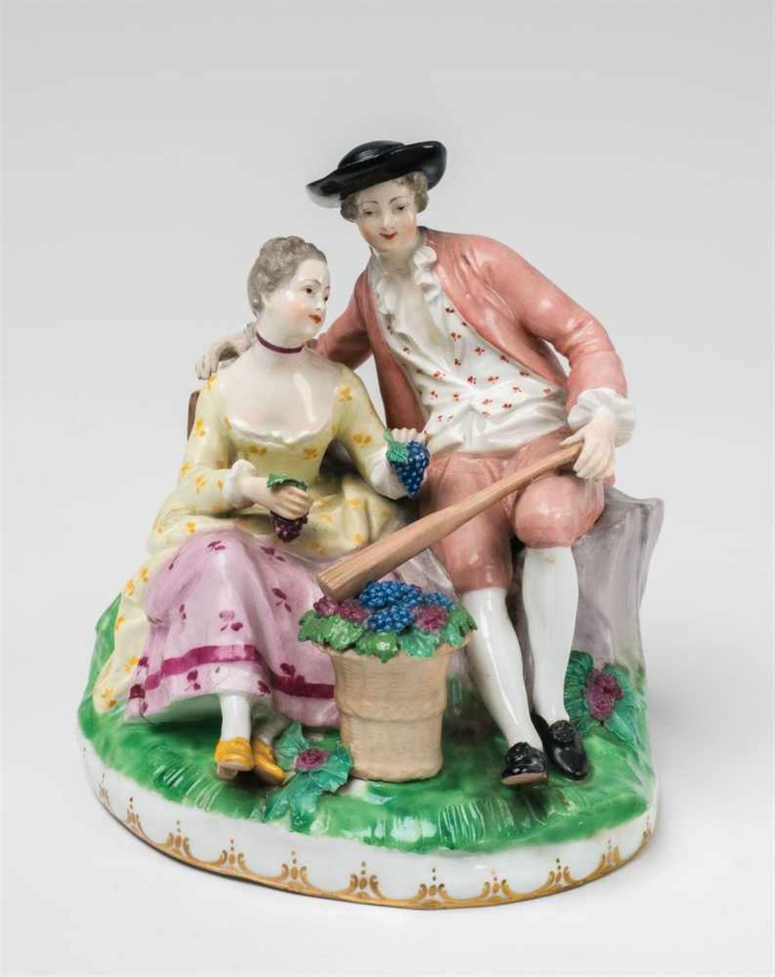 A Vienna porcelain courtship group as an allegory of autumnBlue "bindenschild" mark. The hat brim